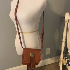 Tan leather cross body with fringe tassel